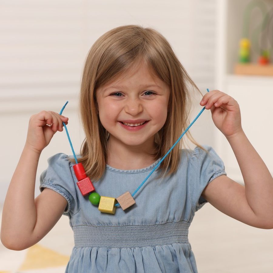 Розвивальна іграшка шнурівка для малюків Геометрика